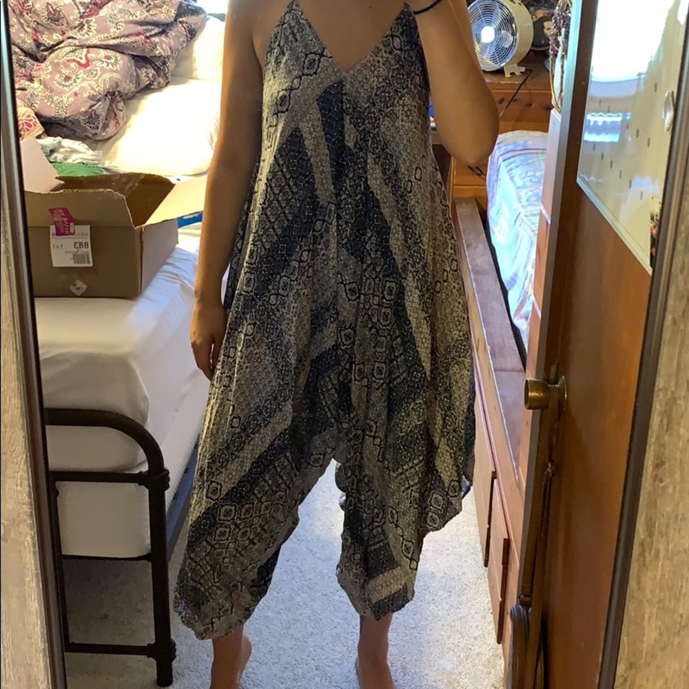 Very loose and flowy jumpsuit with detailed design